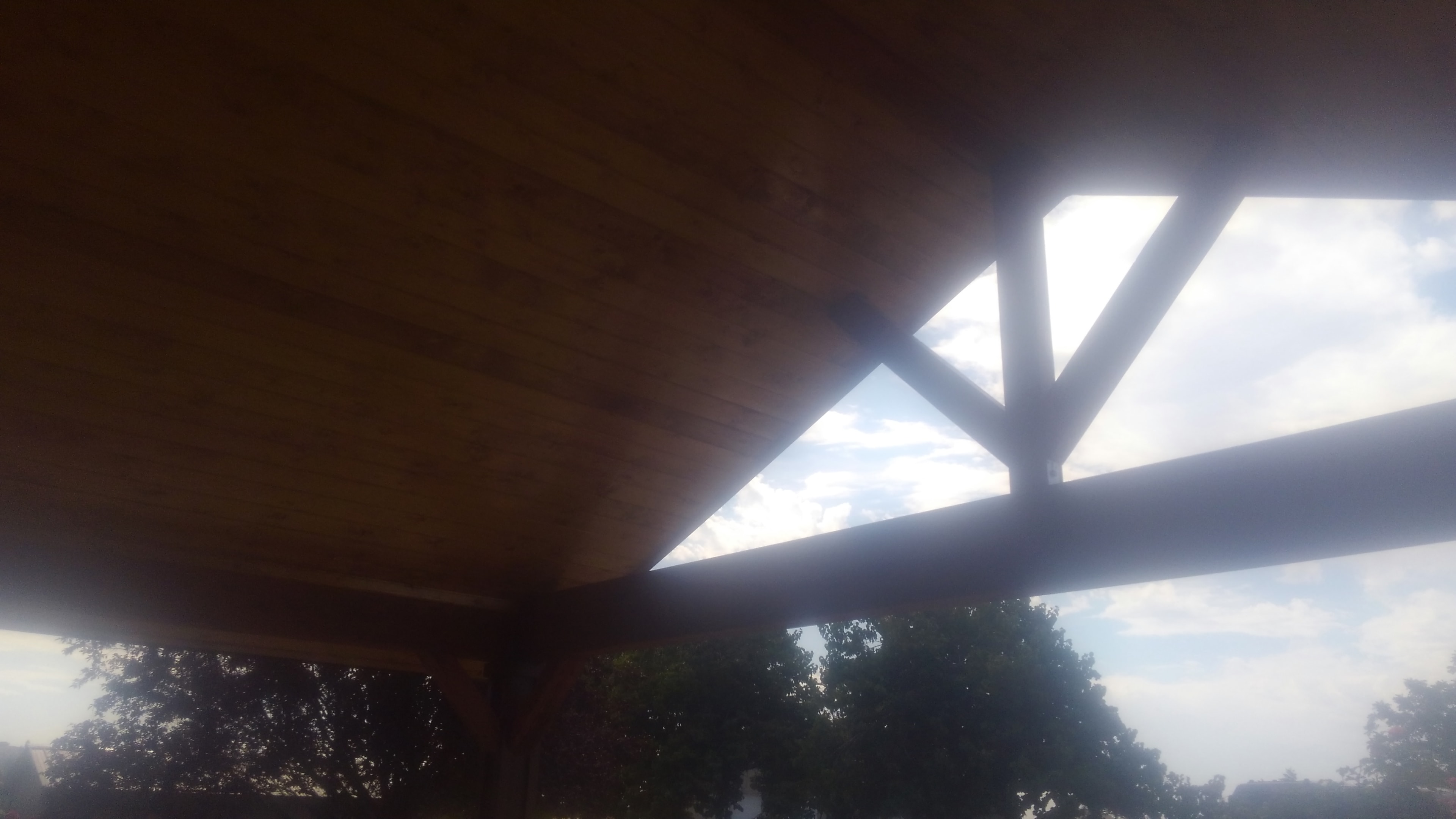 Covered patio addition framing with door trim