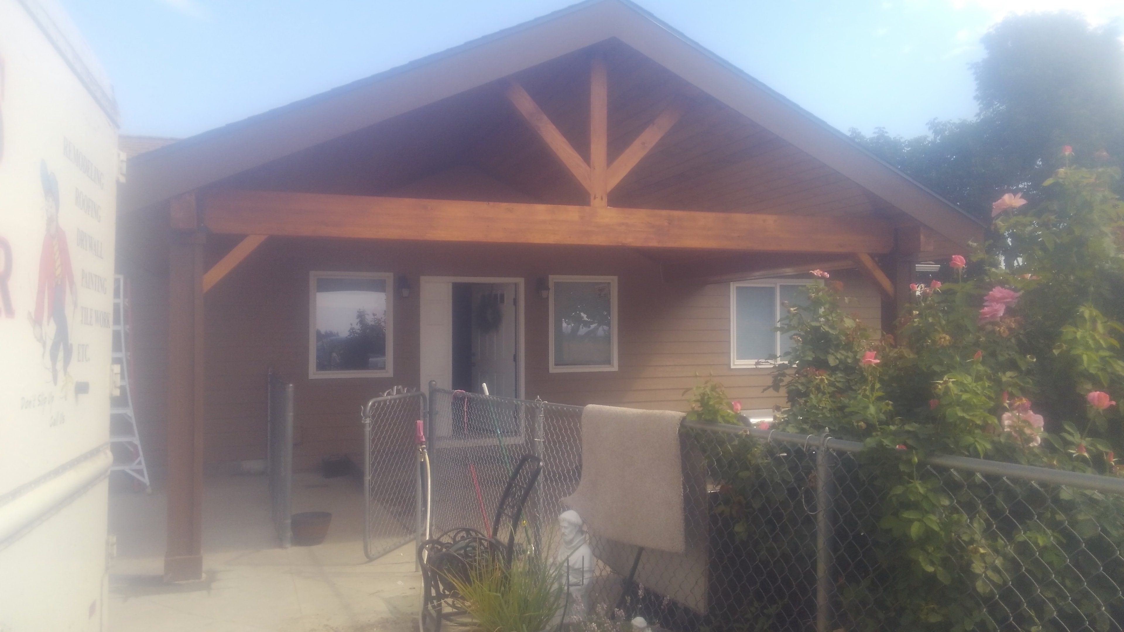 Covered porch framing and siding construction