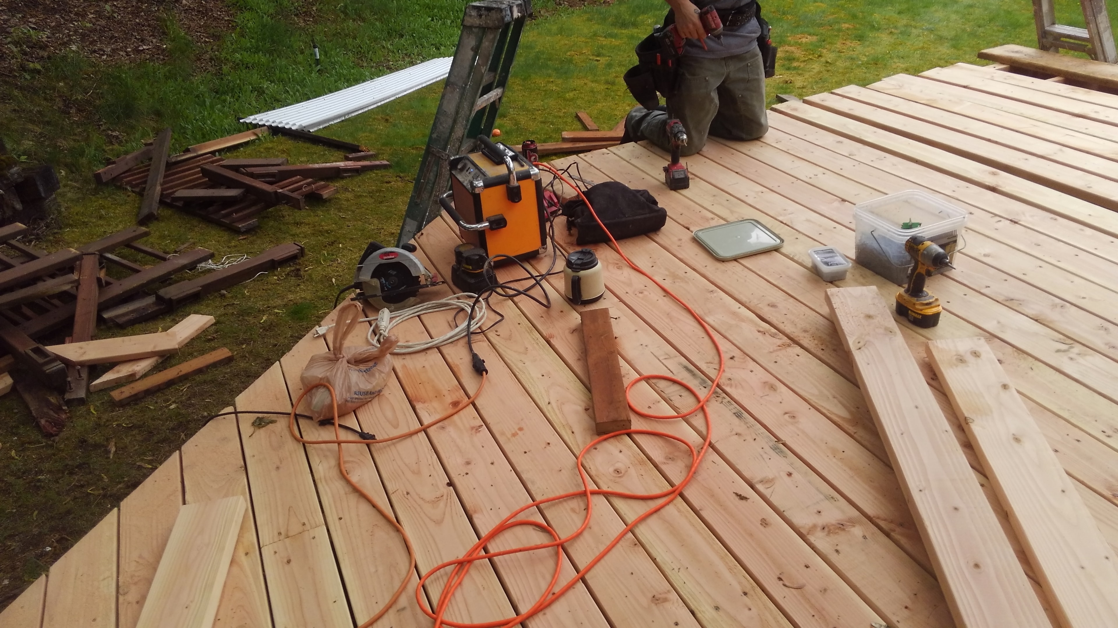 Deck rebuild — cedar boards going down