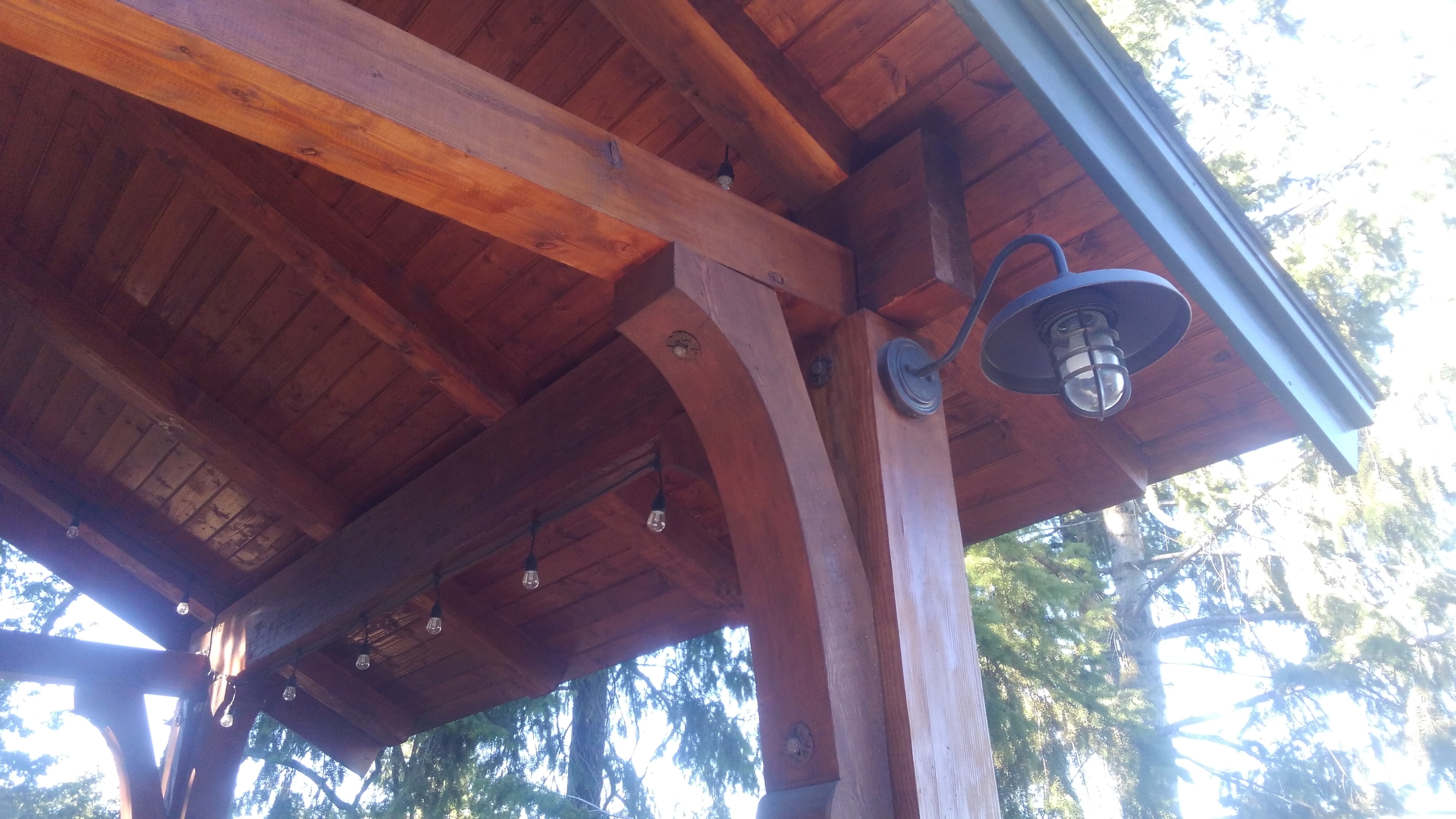 Timber frame pavilion gooseneck barn light detail